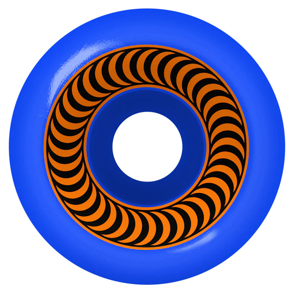 A blue circular object with a hollow center, reminiscent of SPITFIRE F4 OG CLASSIC 99D 54MM BLUE. The inner ring features a pattern of repetitive black, crescent shapes on an orange background, akin to the unique design seen in the SPITFIRE FORMULA FOUR series.