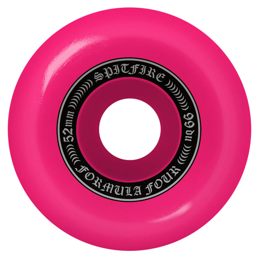 A close-up image of a pink SPITFIRE SPITFIRE F4 OG CLASSIC 99D 52MM PINK skateboard wheel with a black hub shows text: "52mm, Spitfire, Formula Four, no 66.