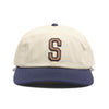 A supremely comfortable STANCE STANDARD ADJUSTABLE CAP VINTAGE WHITE baseball cap with the letter s on it.
