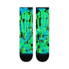 A pair of vibrant STANCE X OUTKAST ATLIENS CREW SOCKS LARGE with black, blue, and neon green abstract patterns. Crafted from a comfortable cotton blend, they offer excellent arch support. The brand name "STANCE" is visible at the bottom of each sock.