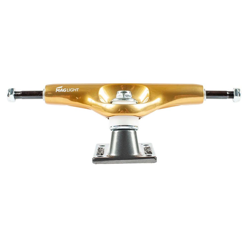 The ollie's TENSOR MAG-LIGHT GLOSSY 5.5 GOLD/GUN METAL skateboard trucks (set of two) feature lightweight magnesium construction and a hollow axle, shown in glossy gold and gun metal against a white background.