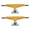 A set of two ollie's TENSOR MAG-LIGHT GLOSSY 5.5 GOLD/GUN METAL skateboard trucks are aligned horizontally against a white background.