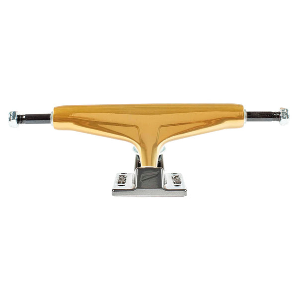 An ollie's TENSOR MAG-LIGHT GLOSSY 5.5 GOLD/GUN METAL skateboard truck set, featuring a gold hollow axle and gun metal baseplate, is shown from the front on a white background.