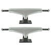 A set of two ollie's TENSOR MAG-LIGHT REFLECT 5.25 silver skateboard trucks with black baseplates and hollow kingpins are stacked vertically on a white background.