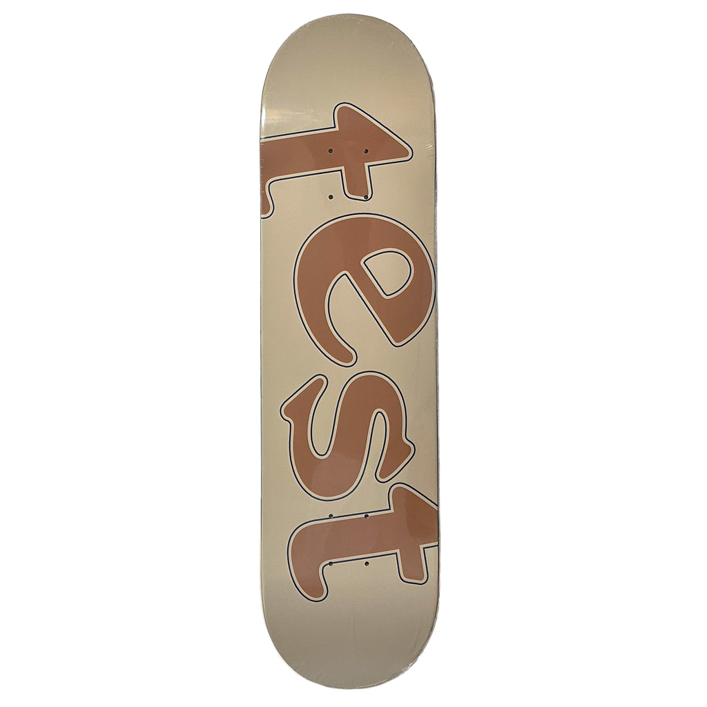 A TEST Tan/Brown skateboard with the word test on its TEST Logo Deck.