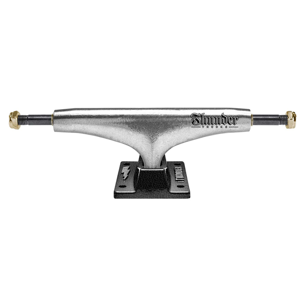 Introducing the THUNDER TRUCKS TEAM HOLLOW GILDED POLISHED 149, a set of two skateboard trucks featuring silver hangers and black baseplates. With "Thunder Trucks" boldly branded on the hangers, these trucks also boast hollow axles for enhanced lightweight performance.