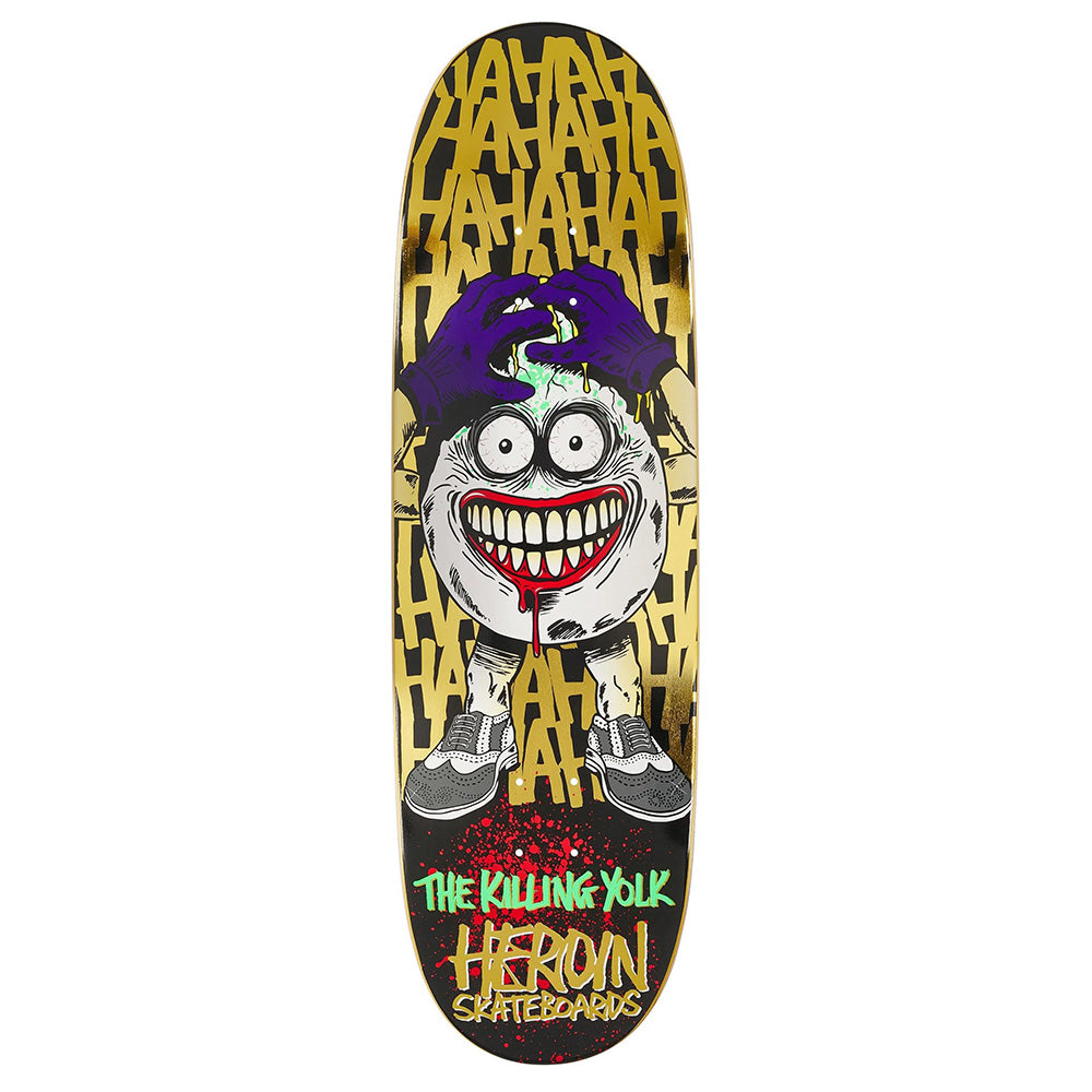 The HEROIN KILLING YOLK SYMMETRICAL EGG skateboard deck features bold graphic text, a cartoonish grinning face with purple gloves and sneakers. Crafted from Hard Rock Maple by HEROIN, this design channels the allegory of fear.
