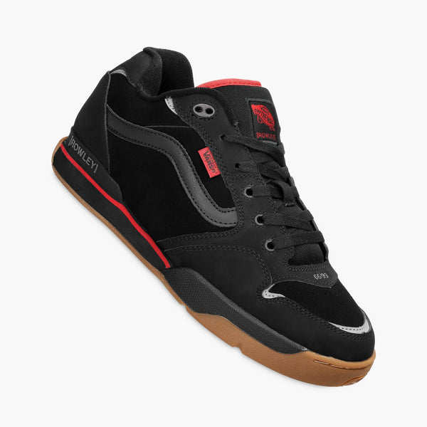 Black and red VANS ROWLEY XLT skate shoe with gum sole, isolated on a white background.