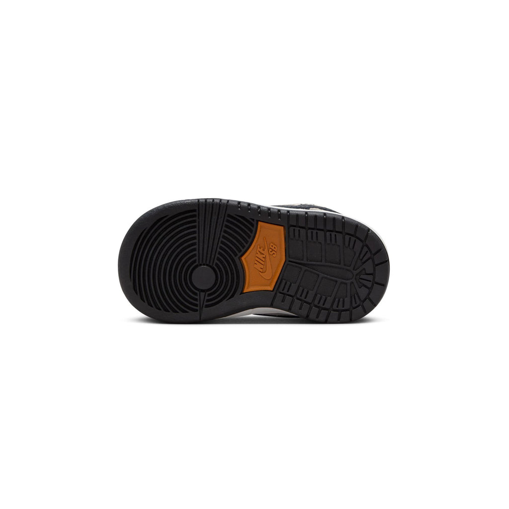 The image depicts the bottom sole of a black sneaker with intricate tread patterns and an orange section featuring the "Nike" logo, reminiscent of the craftsmanship found in the NIKE SB DUNK LOW PRO ELECTRIC TD PHANTOM/BLACK model.