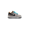 A single child's sneaker from Nike, the NIKE SB DUNK LOW PRO ELECTRIC TD PHANTOM/BLACK, features a grey, black, and orange color scheme with a cheetah print design and turquoise shoelaces—perfect for little ones in pre-school who are already fans of skateboards.