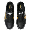 Top view of ASICS JAPAN PRO BLACK / PURE GOLD sneakers featuring textured details and logo on the tongue and insole; designed for durability, they are ideal for skateboarding enthusiasts.