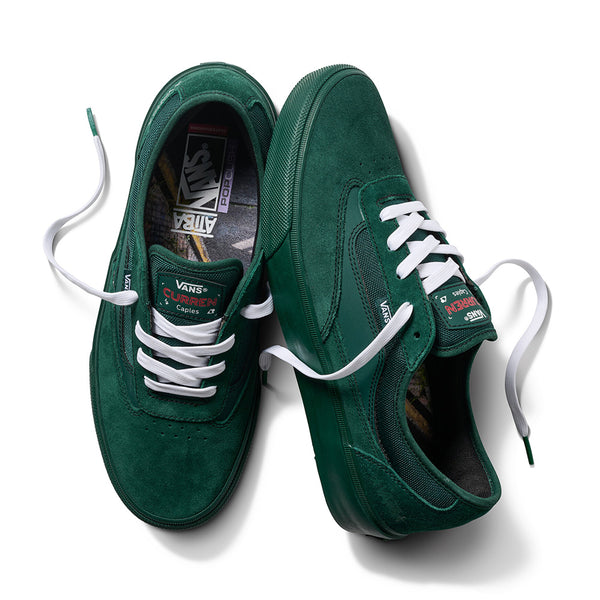A pair of VANS X ATIBA SKATE CURREN CAPLES EMERALD green skate shoes with white laces and POPCUSH insoles by VANS, shown on a white background.