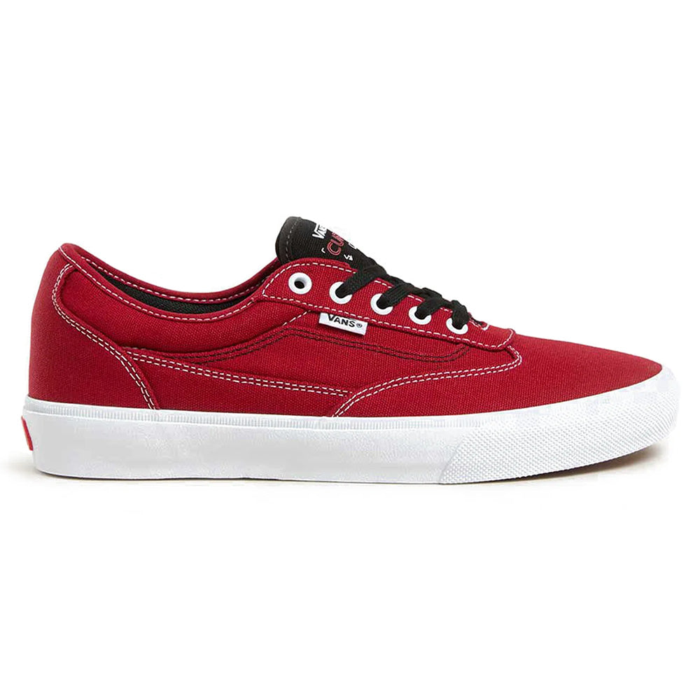 The VANS SKATE CURREN CAPLES RED / WHITE features white stitching, a white rubber sole, black laces, and POPCUSH insoles for comfort, shown from the side.