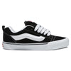 A black and white VANS KNU SKOOL BLACK / TRUE WHITE featuring a durable suede upper, a crisp white stripe on the side, white laces, and a thick white sole. It also includes a comfortable Popcush insole for added support.