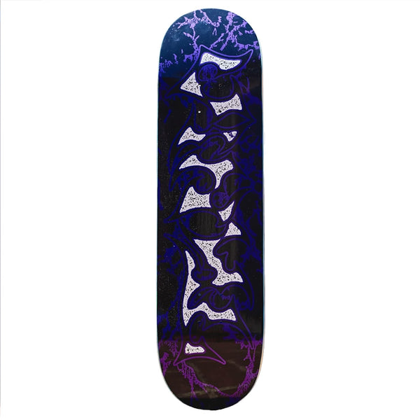 The VINYL METALLIC TRIBAL skateboard deck by VINYL features a bold purple and white tribal graphic with lightning patterns on a dark background, metallic vinyl accents, and measures 8.25 x 31.8 inches.