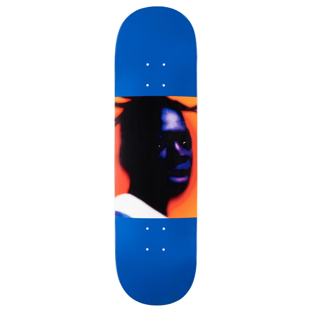 A blue skateboard with a man and the Violet Frank Dorrey "CLEMENTINE" image on it, by violet.