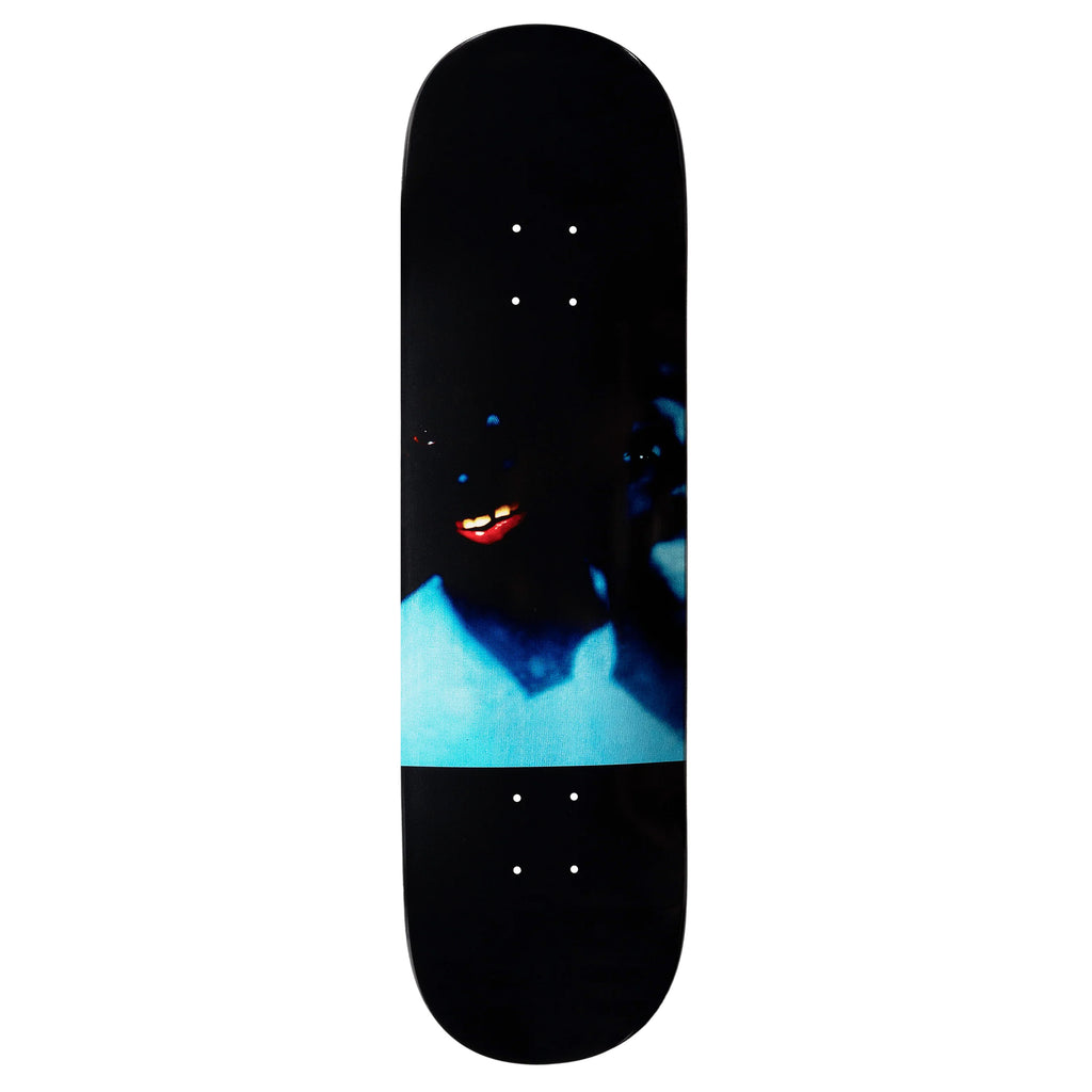 A VIOLET FRANK DORREY "NEVER" skateboard by DELUXE featuring Frank Dorrey wearing a blue shirt.