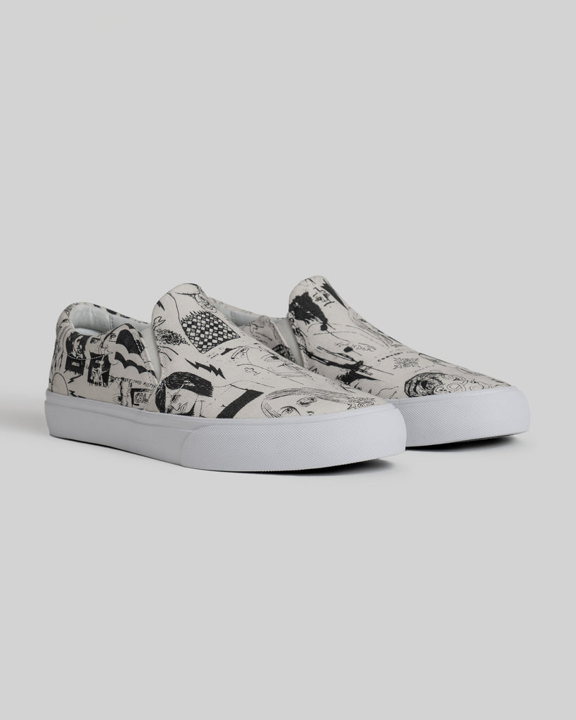 The STRANGER SLIP-ON | TEMPLETON COLLAGE by WARSAW LTD are limited edition white slip-on sneakers with black abstract and graphic prints showcasing Templeton signature artwork, displayed on a light gray background.