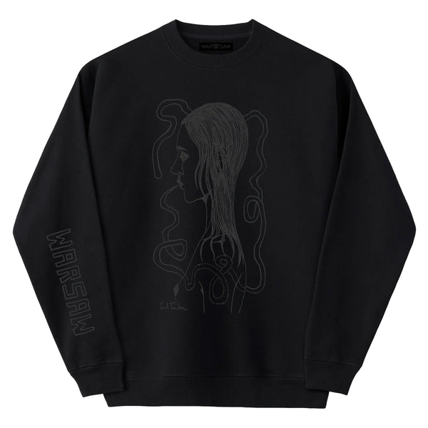 The WAR SAW X TEMPLETON PROFILE CREWNECK BLACK is a unisex black crewneck sweatshirt showcasing a line art illustration of a woman's side profile with abstract shapes, inspired by the edgy aesthetic of Ed Templeton. The word "WARSAW" embellishes the sleeve, adding both style and versatility.