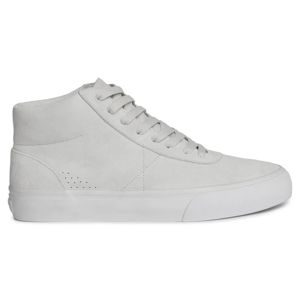 The WAR SAW CHAPTER MID sneaker features a white high-top design crafted from premium pig suede, complete with a stylish vulcanized rubber sole and perforated detailing on the side for a skate-inspired look.