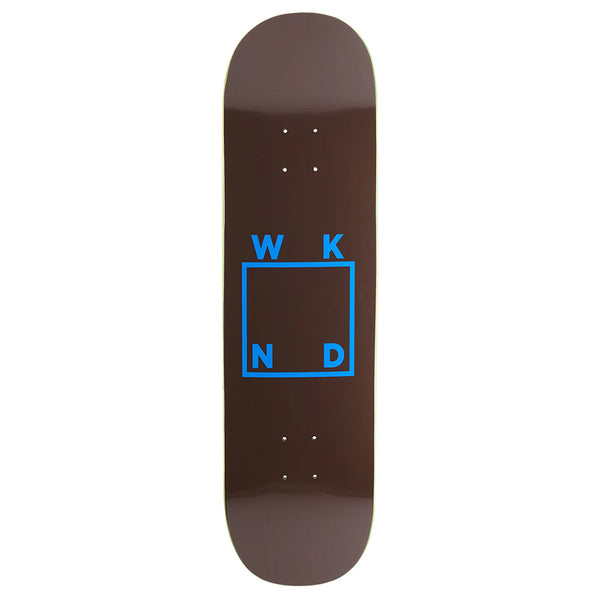 The WKND LOGO BROWN BLUE is an 8.5" skateboard deck by WKND, featuring a brown finish, blue square outline and logo letters at each corner, plus a unique shovel nose design.