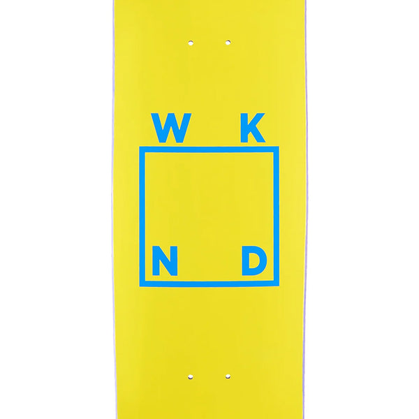 The WKND LOGO YELLOW BLUE skateboard deck by WKND is yellow, 8.6" wide, with a shovel nose and features a blue square at the center displaying the WKND logo lettering in each corner.