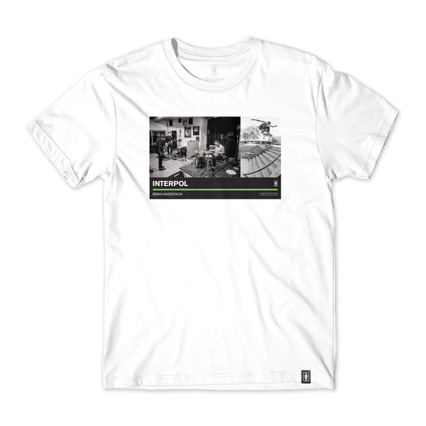 The CRAILTAP x Atiba Tee is a white t-shirt featuring an image of a man riding a skateboard.