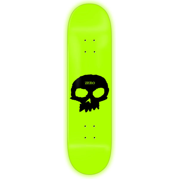 A ZERO skateboard deck with a black skull graphic and the word "ZERO LOGO SKULL *GLOW IN THE DARK" above it.