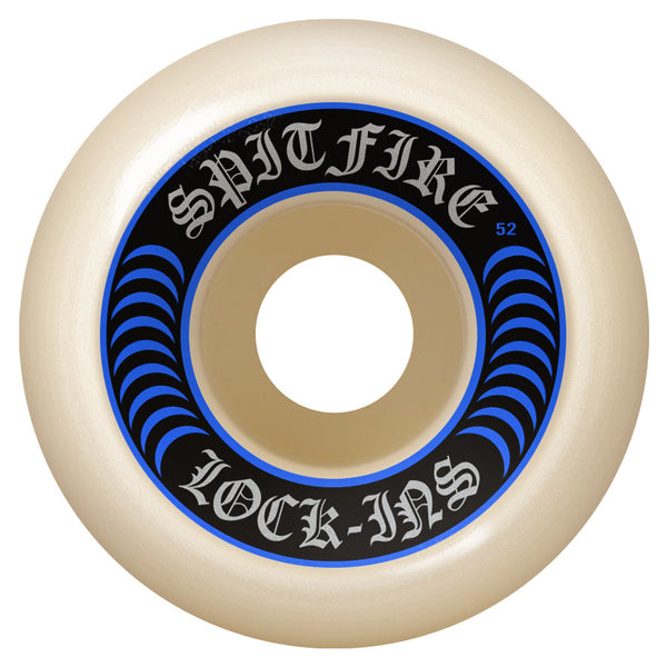 The SPITFIRE F4 LOCK-INS 99D 55MM wheel boasts a blue spiral design with "Spitfire Lock-Ins" text and the number 52, representing Spitfire Wheels' iconic durability and incorporating Formula Four technology for exceptional performance.