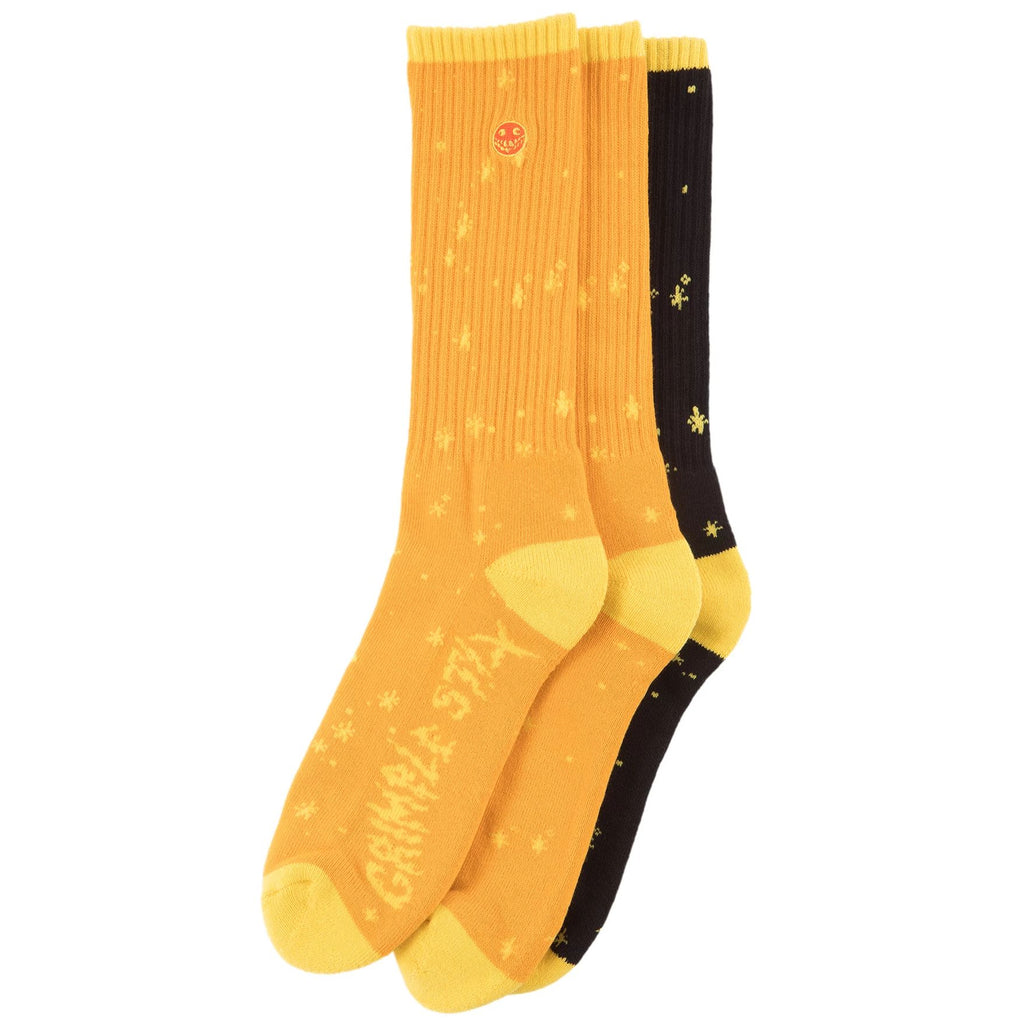 A pair of SPITFIRE GRIMPLE STIX DUST SOCKS (3 SOCKS) ORG/YEL/BLK with star patterns and "shine a star" text.