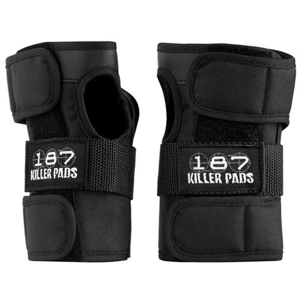 Two black wrist guards from the brand 187, named "187 WRIST GUARD BLACK," featuring Velcro straps for adjustable fitting.