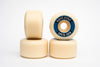 A pair of white SPITFIRE F4 LOCK-INS 99D 53MM skateboard wheels on a white background.