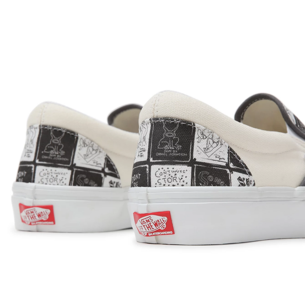 Vans SKATE ERA Daniel Johnston Raven Slip-on skateboarding shoes in the classic white and black colorway now feature a limited edition collaboration with DC Comics. Get ready to showcase your love for skateboarding and iconic comic book characters