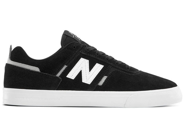 A black and white NB Numeric FOY 306 sneaker available in various sizes.