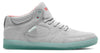 A pair of ES X DGK ACCEL MID SLIM GREY / CORAL / BLUE skateboarding sneakers with green soles.