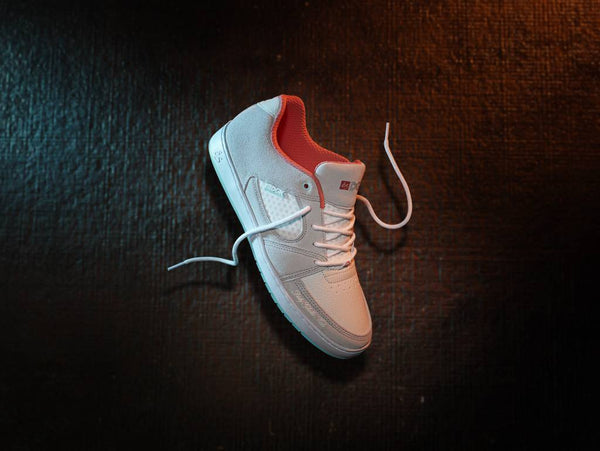 An ES skate shoe on a black background.