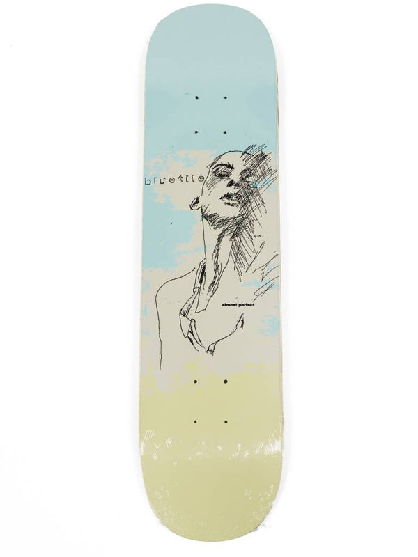 A BLUETILE X H. A. THOMAS "ALMOST PERFECT" skateboard with a drawing of a woman on it by Bluetile Skateboards.