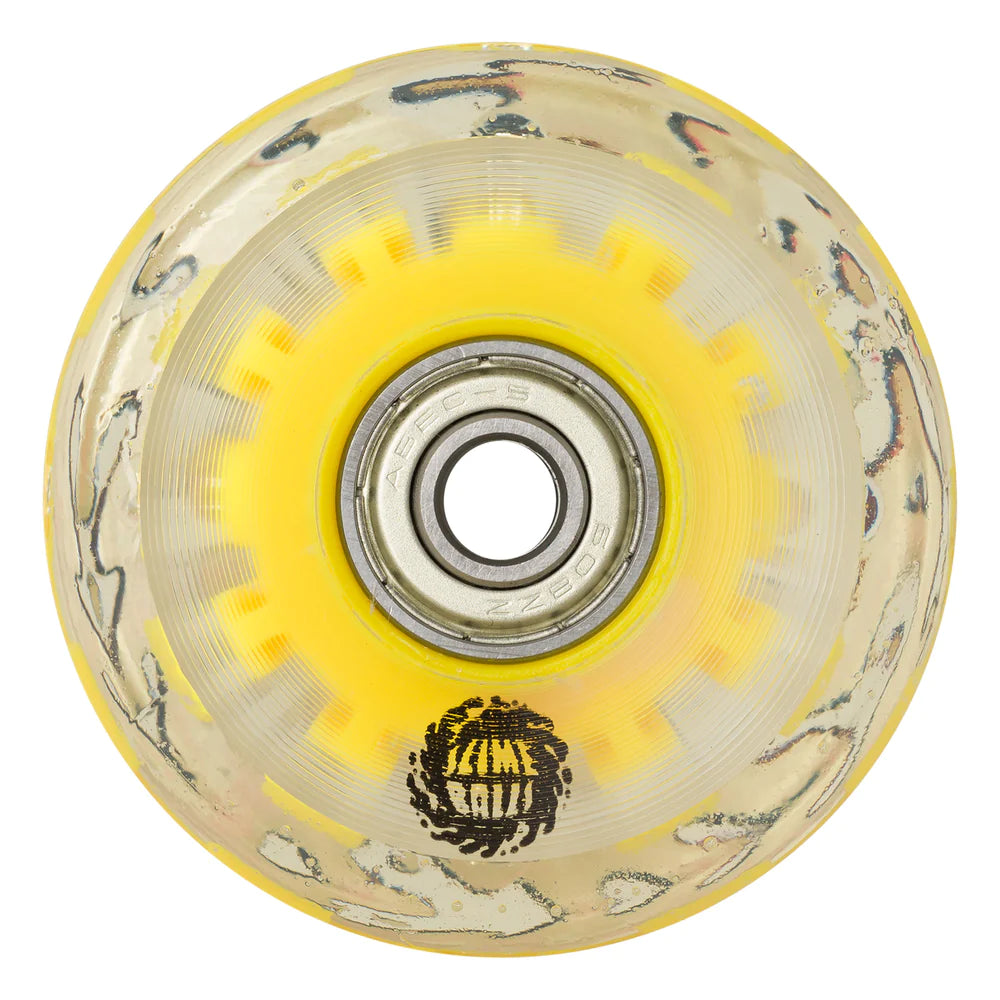 A yellow SLIME BALLS skateboard wheel with a lion on it.