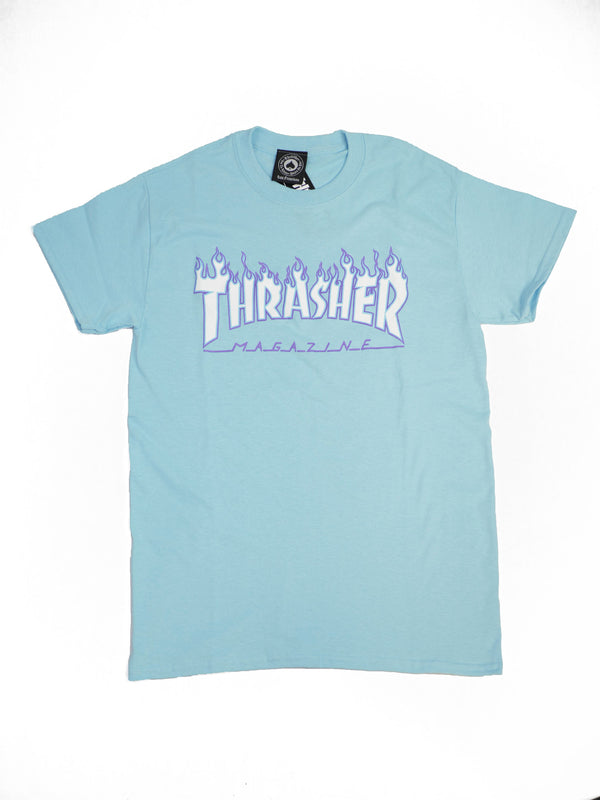 A Sky Blue "Thrasher Flame Logo" T-shirt featuring the iconic Thrasher Magazine logo printed on the front in purple and white with a flame design.