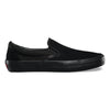 A black slip on shoe with a black sole.