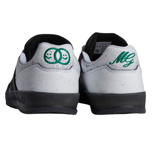 A pair of ADIDAS GONZ ALOHA SUPER KOOLS CLOUD WHITE / CORE BLACK / BOLD GREEN sneakers.
