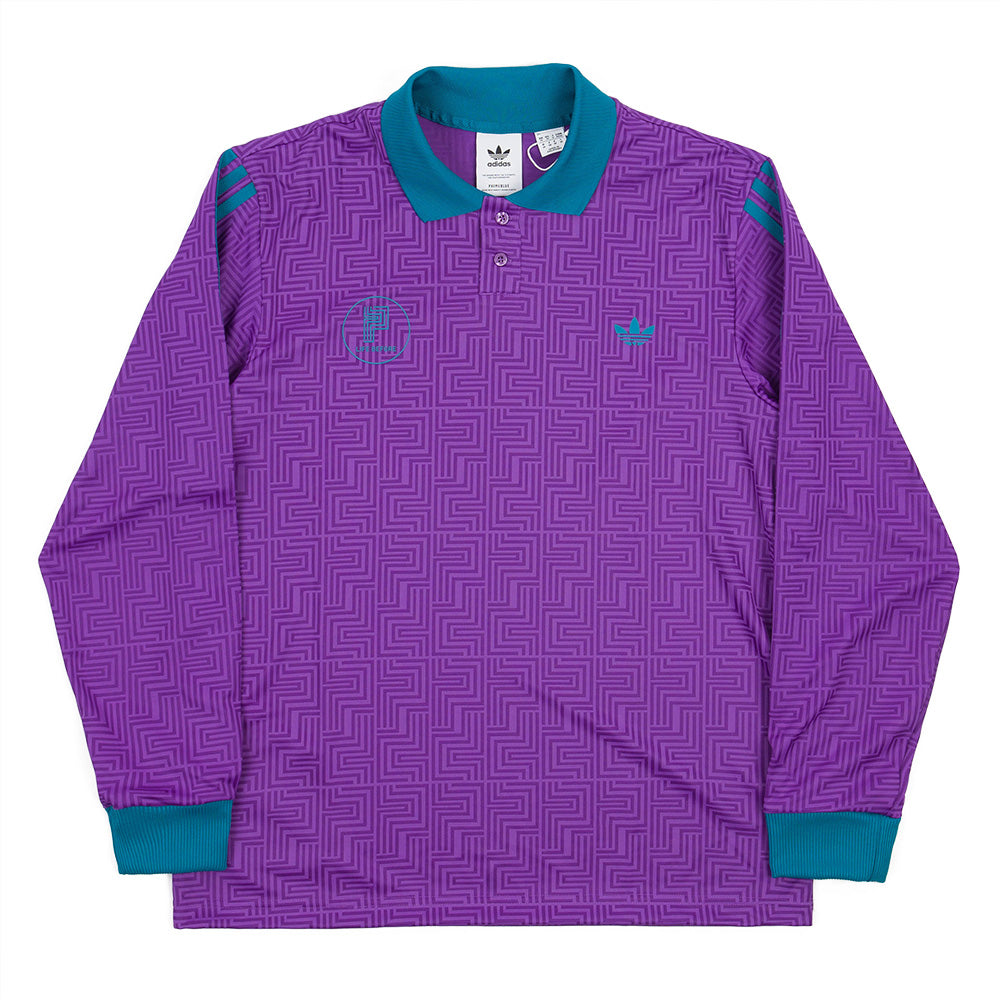 A long-sleeve ADIDAS Paradigm Jersey in Active Purple and Black, featuring a geometric pattern with teal accents on the collar, cuffs, and shoulder stripes.