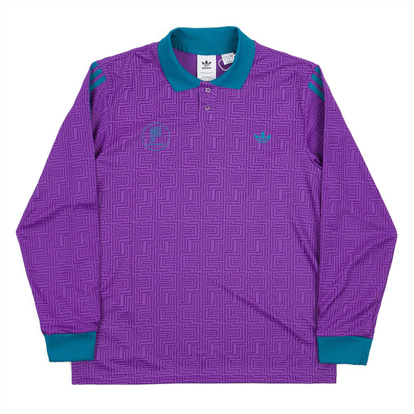 A long-sleeve ADIDAS Paradigm Jersey in Active Purple and Black, featuring a geometric pattern with teal accents on the collar, cuffs, and shoulder stripes.