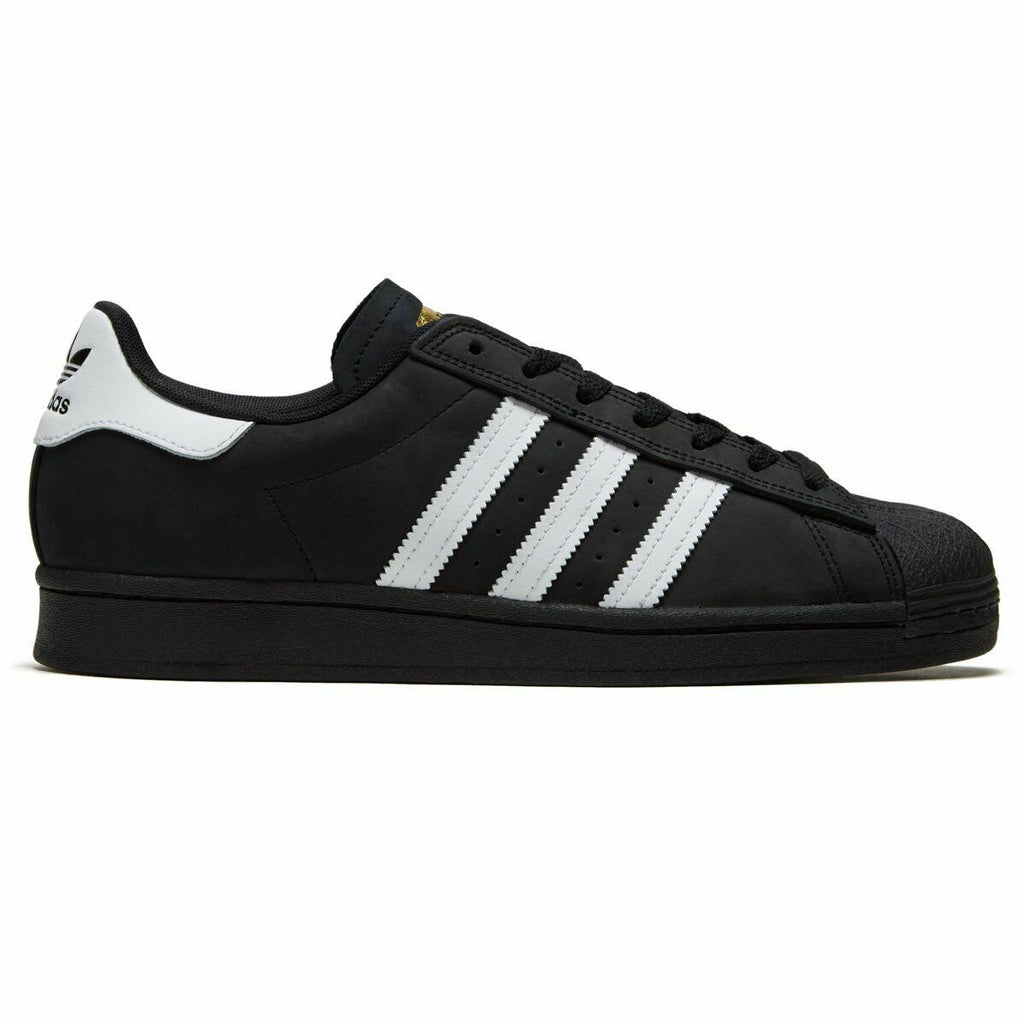 A black and white Adidas Superstar ADV sneakers.