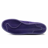 A dark purple sole of an ADIDAS KADER SUPERSTAR ADV DARK PURPLE / GOLD METALLIC shoe on a white surface.