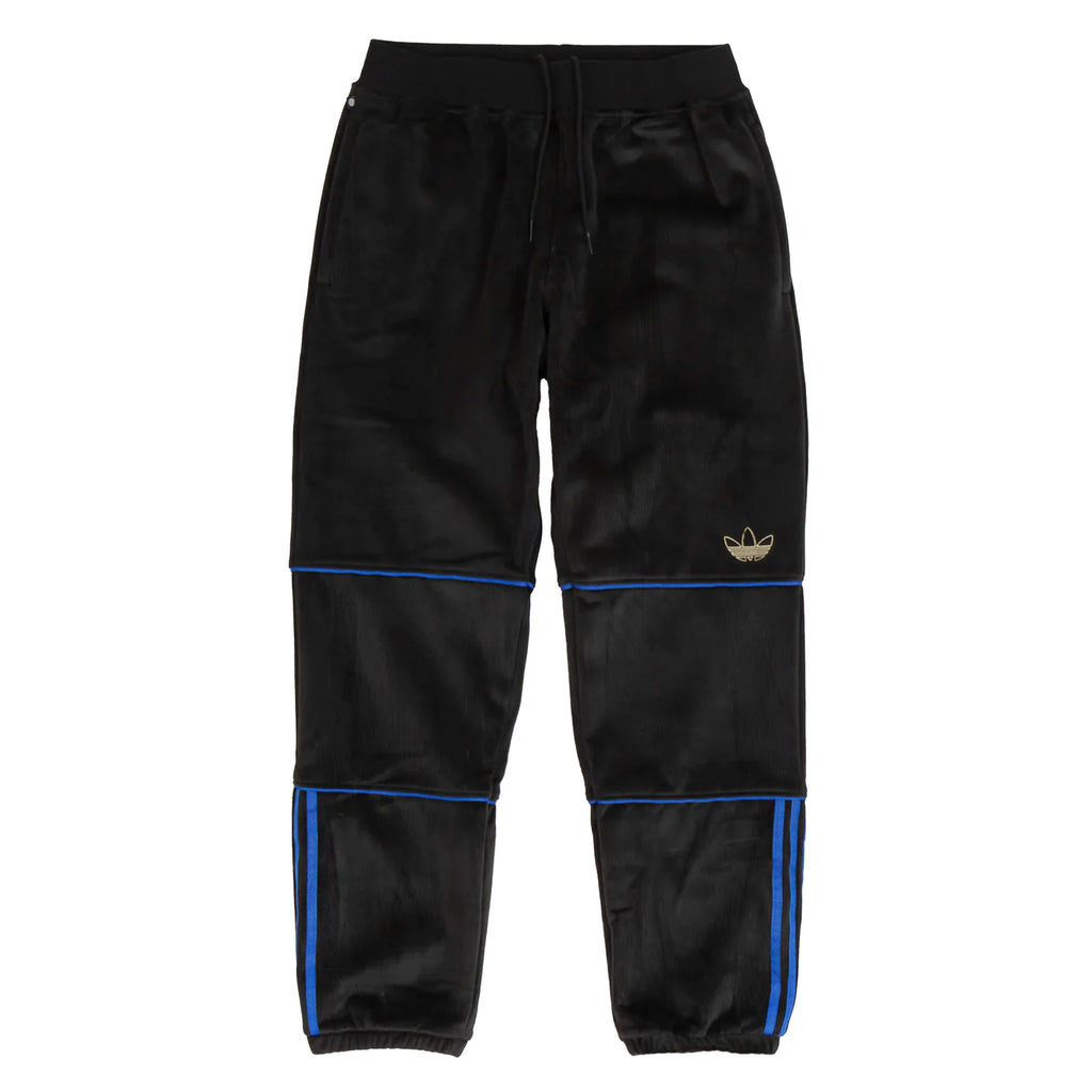 A pair of ADIDAS TYSHAWN VELOUR SWEATPANTS with blue trims.