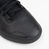 A close up of a black ADIDAS TYSHAWN BLACK / WHITE / BLACK sneaker.