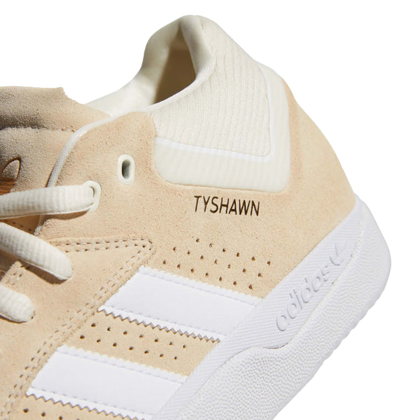 Adidas Tyshawn Off White / Cloud White sneakers.