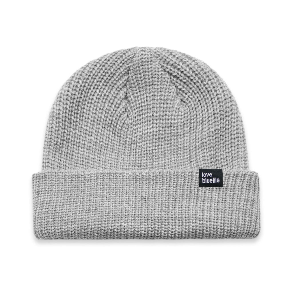 A Bluetile Skateboards BLUETILE LOVE ALWAYS CABLE BEANIE ATHLETIC HEATHER on a white background.