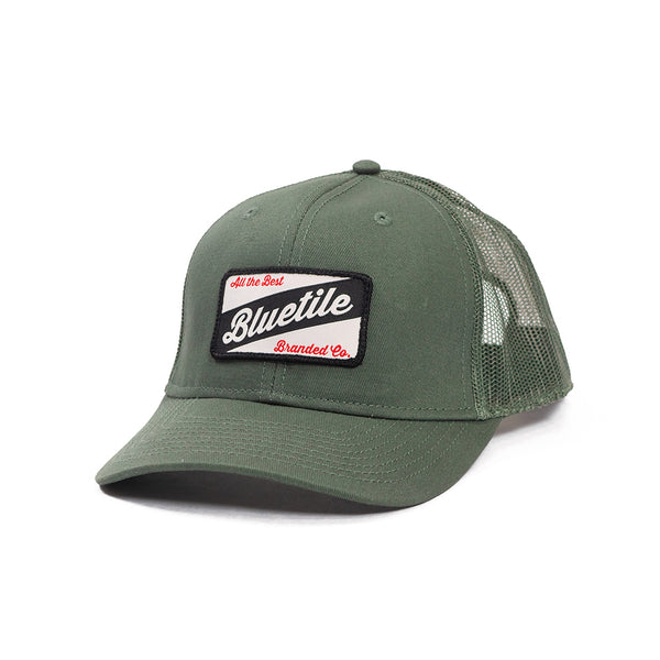 A Bluetile Skateboards BLUETILE CRAFT PATCH TRUCKER CYPRESS hat with the word sylville on it.